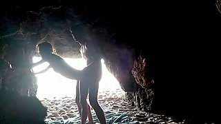 Couple recorded at the beach, inside the cave