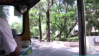 Petite Thai MILF riding in a Tuk Tuk