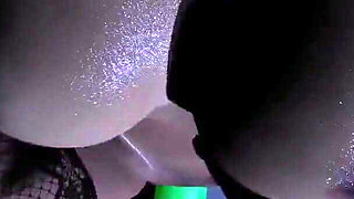 She rides a huge dildo in the shower