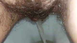 the longest trip to the bathroom, a very long piss, a hairy pussy peeing