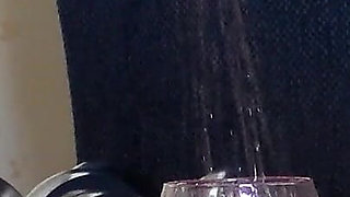 Jen Is Peeing Into a Wineglass
