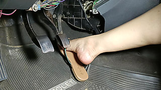 Accelerating and Pumping Racing Pedals Wearing Flip Flops
