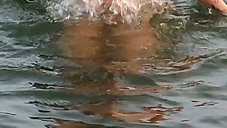 POV. You Watch as a Busty Model, of Your Presence, Strips Naked on the Beach, Bathes, and Plays in the Sand.