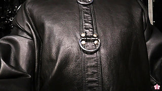 Lady Amber Encases Slave Mila Layers of Leather