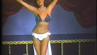 Watch Some Hot Retro Girls Dancing and Taking off Their Clothes