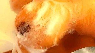 Amateur black Diamond takes a shower and masturbates