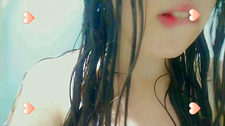 Totally wet horny babe taking a  hot shower and masturbation, mouth close up, wet hair and cute bra