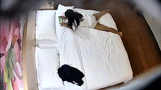Cute amateur asian web cam girl playing with her toy