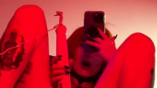 Tattooed redhead has intense orgasm with vibrator