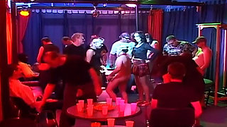 Blonde Babe Gangbanged by Horny Crowd in Wild Club Orgy