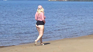 Big Ass in Shorts and Leather Leggings