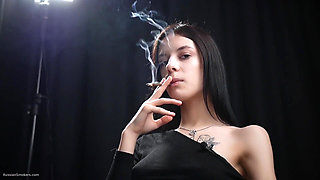 Slim Chick Is Smoking One Red