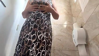 Horny Mature Woman Masturbates in a Public Toilet and Fingers Her Pussy to Orgasm