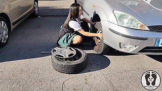 Dirndl Slut Gets Dirty and Oily Changing Tires