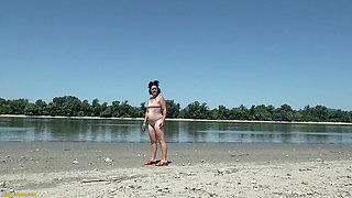 Tattooed MILF Gets Surprised While Sunbathing