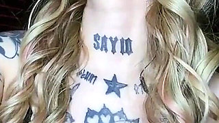 Sexy Alternative Blonde Drinking and Burping