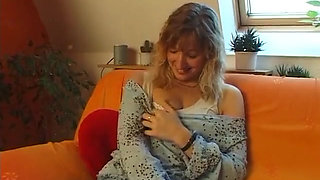 Lovely blonde with pierced tits rubs her pussy at the casting