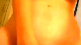 Big-Titted Blonde Plays with Dildo on Webcam