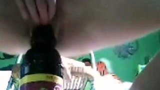 Girl's Solo Cam Show With A Bottle As A Dildo