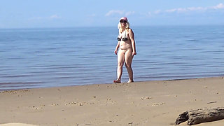 Mature Beach Slut Invites Guys to Fuck Her Holes