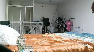 Cute amateur asian web cam girl playing with her toy