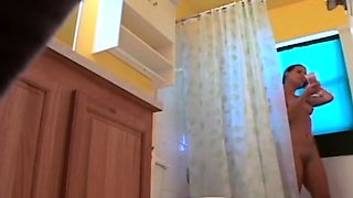 Stepdaughter 21 shaves pussy in shower (voyeur)