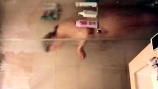 curvy stepmom 51 shaving her pussy in the shower