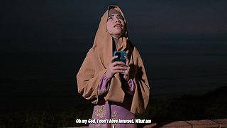 A Muslim woman is fucked by two dark-skinned men