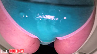 Piss panties wetting in public toilet