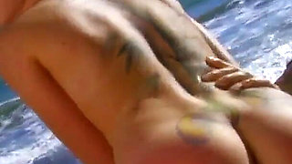 Milky Cooper a naughty girlfriend with light hair gets turned on with a cock in her pussy on a beach