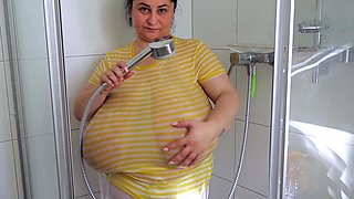 Busty curly brunette with big boobs fucks on couch