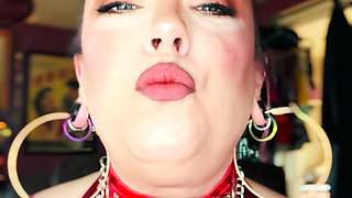 Leather Clad Tina Snua Smoking A Cigarette With Lots Of Dangles