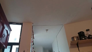 Fat milf in naked kitchen showing tits