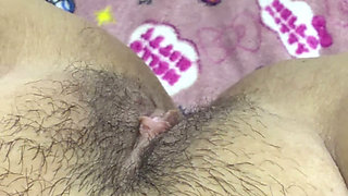 Mom masturbates and plays with her delicious hairy pussy
