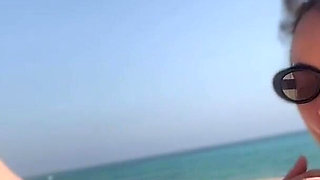 Fans Peeping Me Giving a Blowjob on a Public Nudist Beach