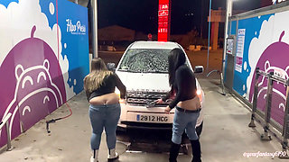 Two girls washing the car with butt cracks out