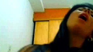 Squirting webcam babe with her cat