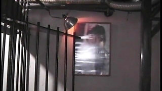 Mature mistress chastises and punishes alluring blonde female parent in BDSM chamber