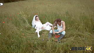 BRIDE4K. Pretty brunette bride fucks a horny shepherd in a summer field