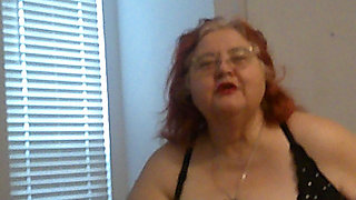 Mature BBW Redhead Nurse Vicki Talks to You as She Makes a Lipstick Applying Video for You!