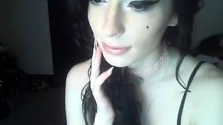 Brunette enjoys the toy on gaping pussy while masturbating