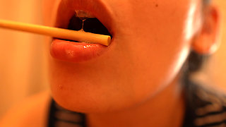 I’m Sucking and Licking a Popsicle, Playing with It Using My Lips and Mouth.