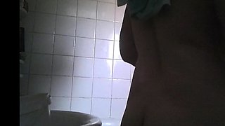 big boobed stepmom spied in the bathroom