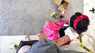 Redhead in an Oktoberfest Costume Gives an Incredible Handjob to a Big Cock Guy