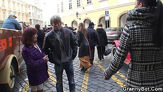 Horny dude picks up redhead granny for play