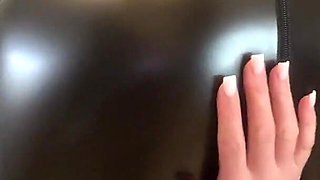 Testing Out New Butt Plugs in a Latex Suit