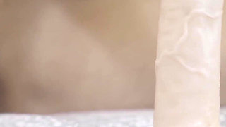 Blonde MILF Indulges in Footjob and Dildo Play