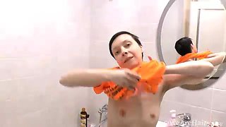 Trixie masturbates with her shower head - WeAreHairy