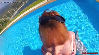 British Mature Red XXX sucking cock in a pool