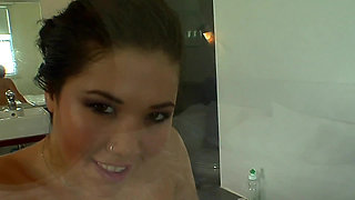 Busty asian beauty masturbating in the bathtub